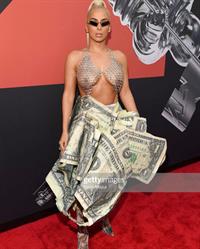 Veronica Vega showing off her braless boobs on the red carpet at the MTV VMA's in a see through top.














