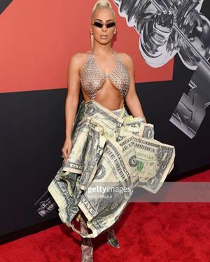 Veronica Vega showing off her braless boobs on the red carpet at the MTV VMA's in a see through top.














