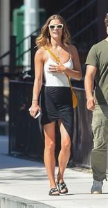 Nina Agdal braless tits pokies in a tight white top seen by paparazzi.















