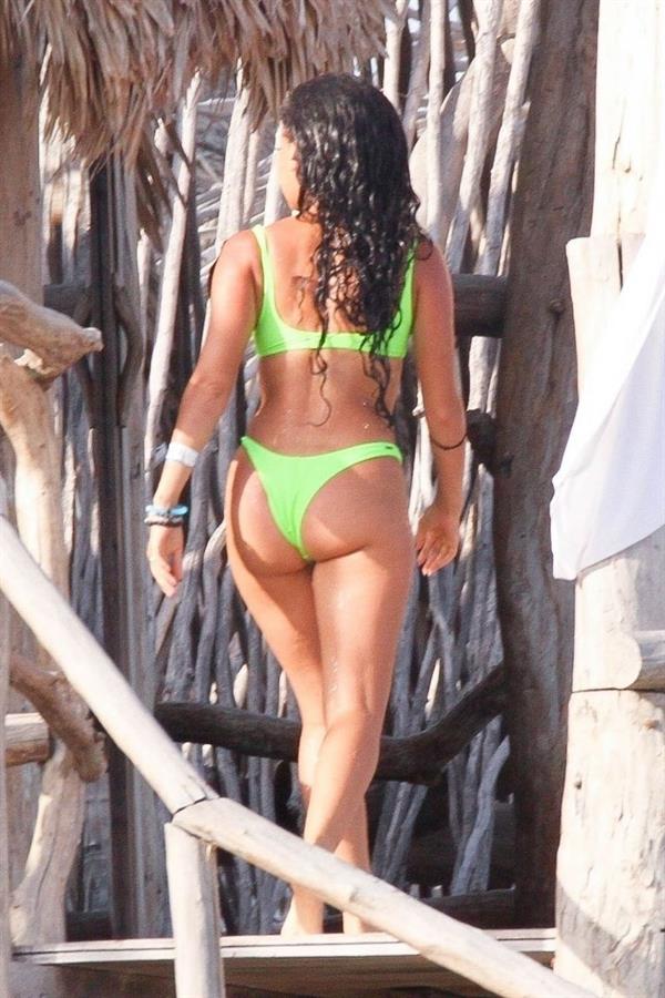 Vanessa Morgan in a tight green bikini showing nice cleavage and her sexy ass seen by paparazzi.




















