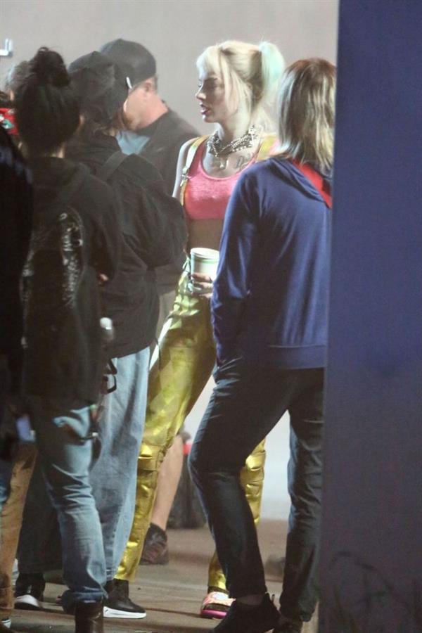 Margot Robbie sexy filming an action scene as Harley Quinn in the new movie  Birds of Prey .

















