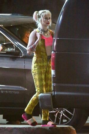 Margot Robbie sexy filming an action scene as Harley Quinn in the new movie  Birds of Prey .

















