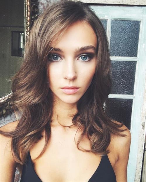 Rachel Cook in a bikini taking a selfie