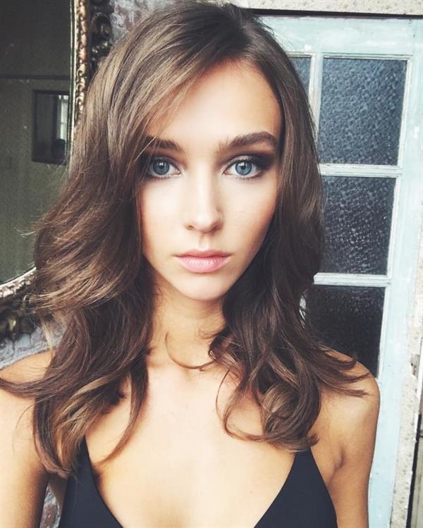 Rachel Cook in a bikini taking a selfie