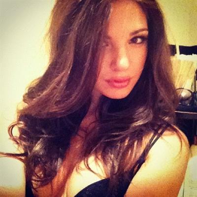 Jessica Ashley in a bikini taking a selfie