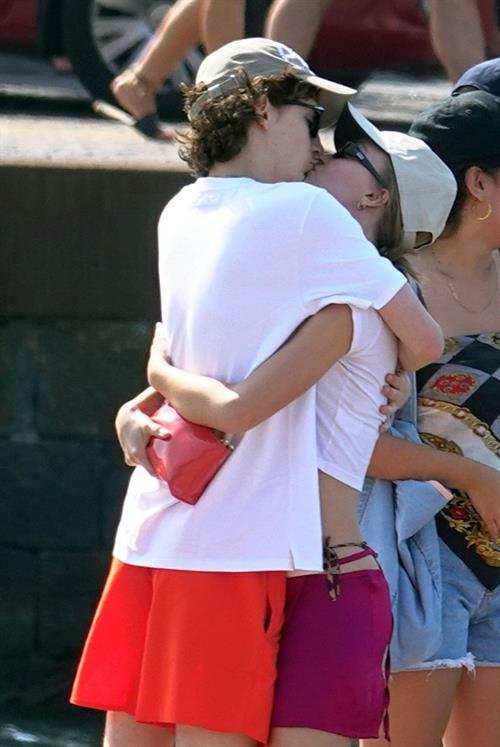 Lily-Rose Depp Pictures Lily-Rose Depp sexy ass in a little thong bikini making out with Timothee Chalamet on a boat seen by paparazzi.