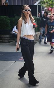 Suki Waterhouse braless tits seen by paparazzi in a white blouse top showing off her boobs.
















