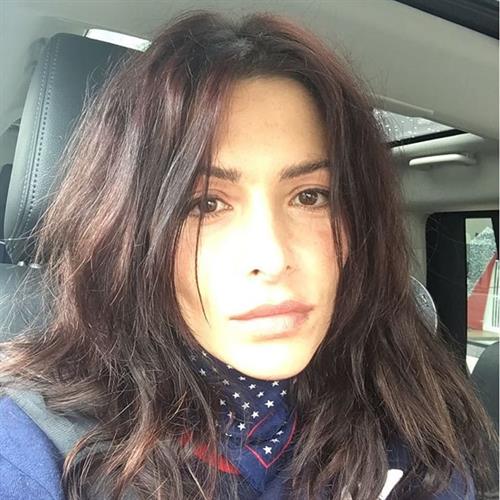 Sarah Shahi taking a selfie