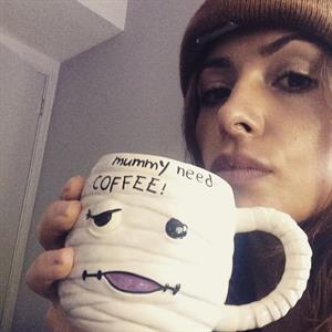 Sarah Shahi taking a selfie