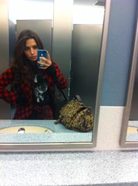 Sarah Shahi taking a selfie