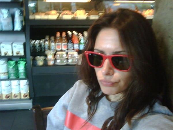 Sarah Shahi taking a selfie