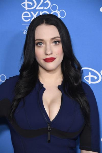 Kat Dennings famous big boobs showing nice cleavage in a tight blue dress.

































