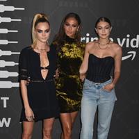 Gigi Hadid braless boobs in a see through top showing off her tits seen by paparazzi with Cara Delevingne and Joan Smalls.













































