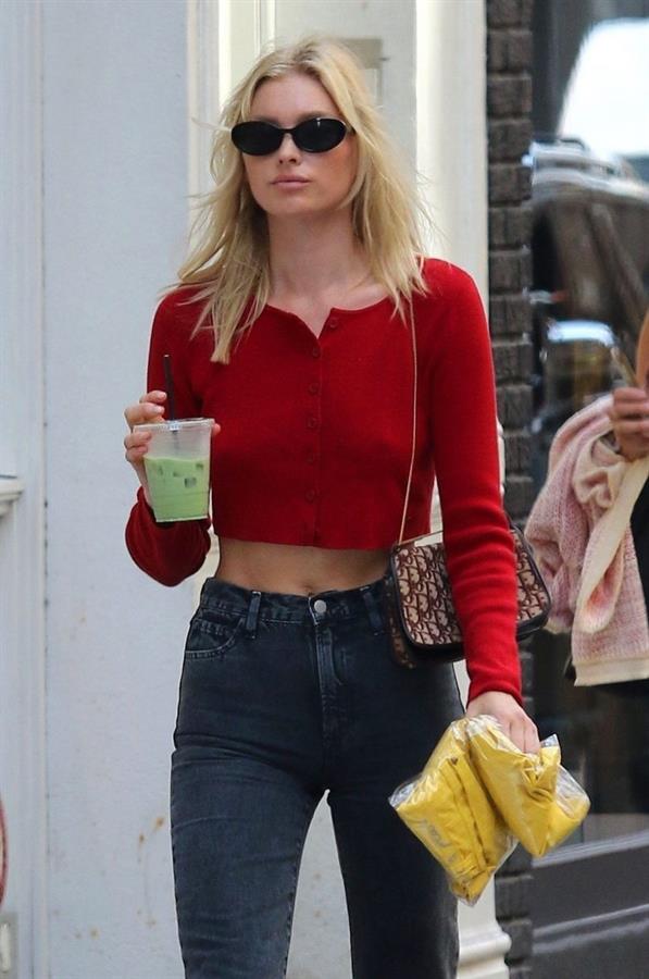 Elsa Hosk braless tits pokies in a little red top showing off her tits seen by paparazzi.





