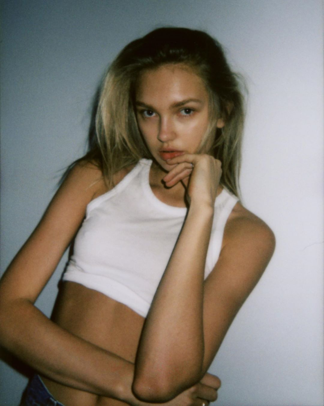 Romee Strijd Pictures Romee Strijd braless boobs in a little white top showing off her tits.