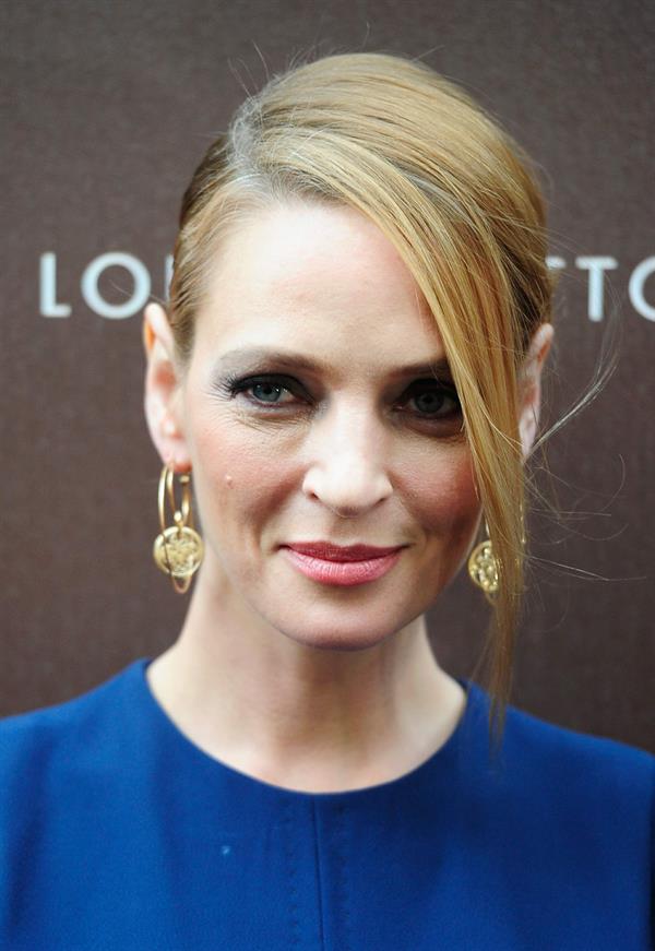 Uma Thurman Louis Vuitton Maison opening in Munich 4/23/13 