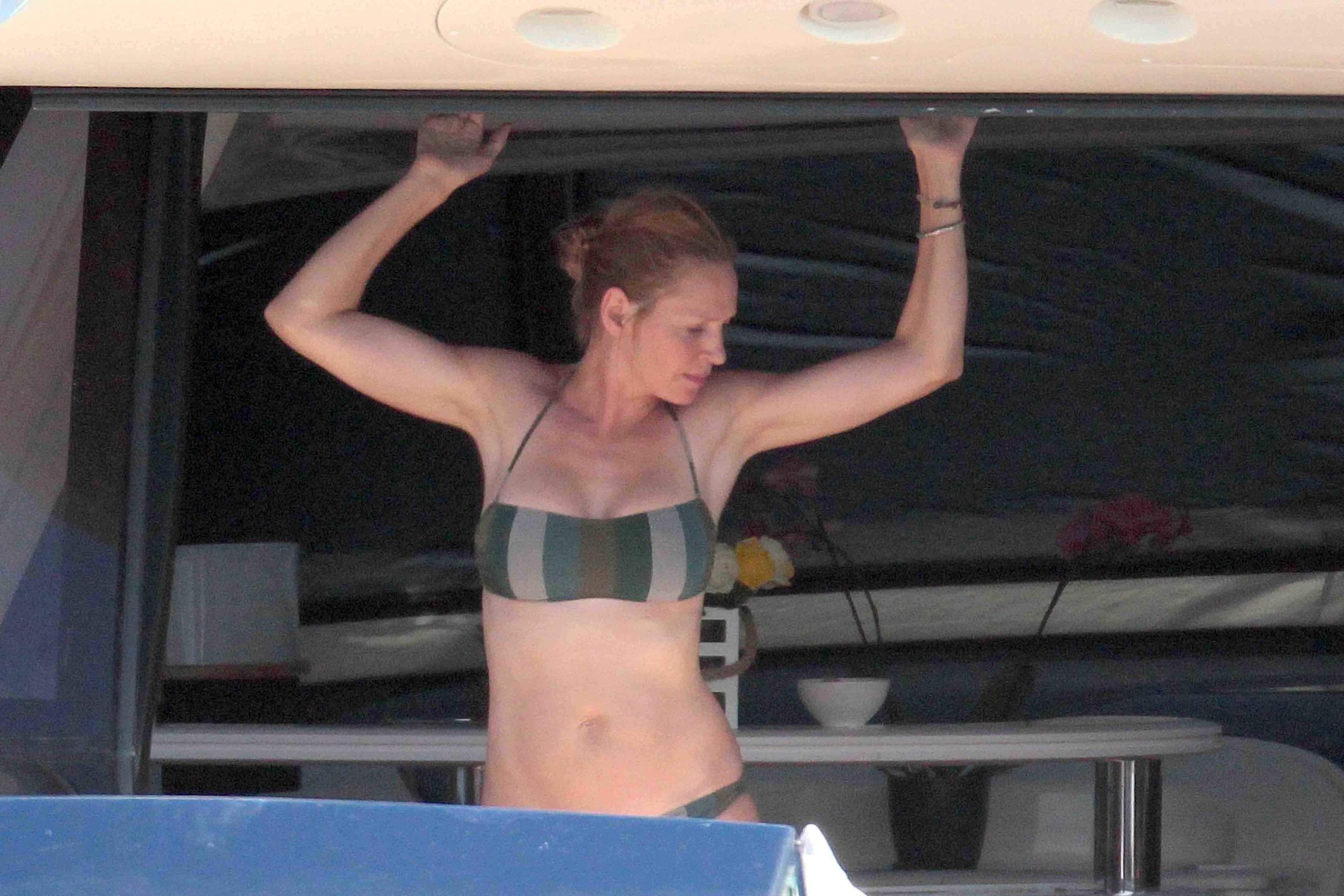 Uma Thurman on a yacht in St Trope July 6, 2013 