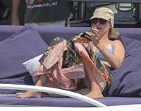 Uma Thurman wearing a bikini top on a yacht in St Tropez July 7, 2013 