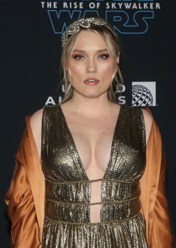 Clare Grant braless boobs showing nice cleavage in a low cut sexy dress photographed at the premiere of  Star Wars: The Rise Of Skywalker .