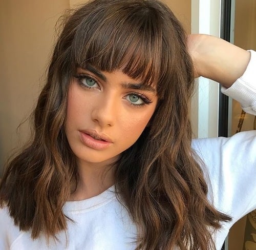 Yael Shelbia taking a selfie