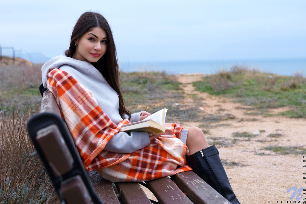 Long chestnut hair waves in the wind before Delphina comes inside. Relocating to the bedroom, she peels off her panties and slides her fingers down her slippery twat. She's already wet and ready to cum, so watch her slide her fingers into her cream filled fuck hole as she moans in pure delight.