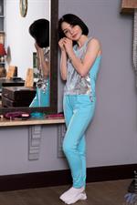 Looking fine in a pair of sexy earrings to complement a casual outfit, Naja is more interested in getting naked than in staying clothed. As soon as her panties hit the floor, the Russian stunner goes to work enjoying herself from her puffy little titties to a stroke of her cum hungry bald snatch.