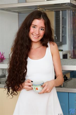 Adel Divine Nude Pictures Long red hair and a great body are the first things you'll notice about Adel Divine. This hot Russian teen is a little shy about taking off her clothes, but once she's nude you won't be able to peel her hands away from her small titties or the liquid heat of her bald pussy.
