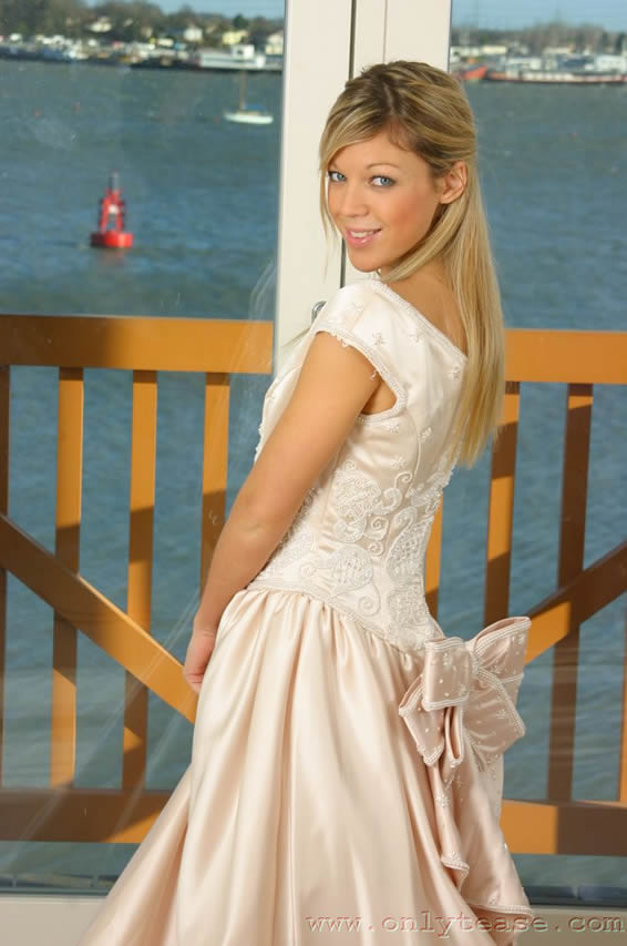  Sexy blonde in wedding dress with white lingerie 