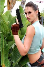 Busty Lana Kendrick gets in costume as Lara Croft to celebrate Halloween