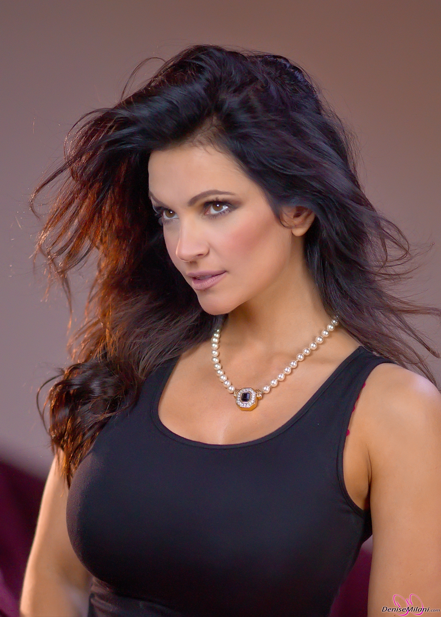 Denise Milani Photoset - Red Sofa