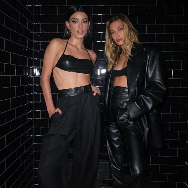 Dixie D’Amelio and Hailey Bieber sexy posing together in little bra tops showing off their tits and abs.
