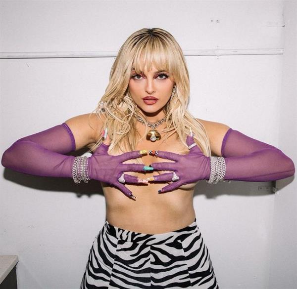 Bebe Rexha topless boobs new photo while promoting her new album holding her nude big tits.