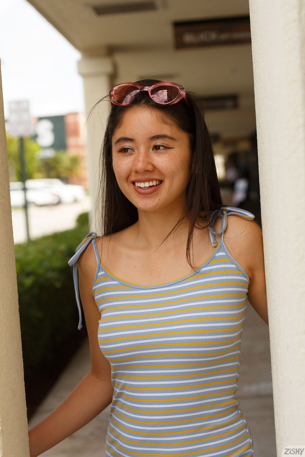 Lolita Minh Strips in her Room