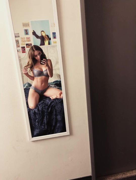 Sydney Sweeney in lingerie taking a selfie