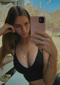 Emily Feld taking a bikini top selfie 