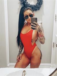Marisa Laren in a bikini taking a selfie