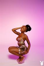 Sabrea Phenix flirty ebony in the studio for Playboy