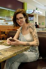 Maggie O Shannon in a Black Lace Bodysuit