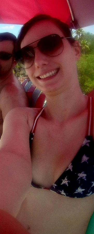 Liv in a bikini taking a selfie