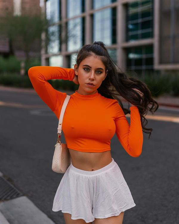 Orange Long Sleeve Top White Skirt