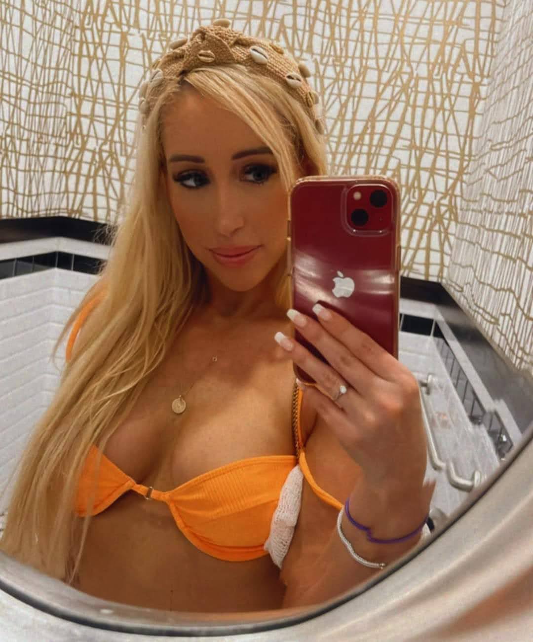 Michelle leszkiewicz in a bikini taking a selfie
