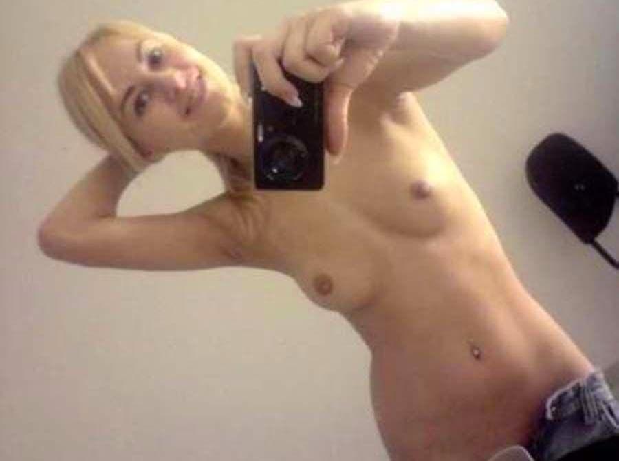 Anonymous taking a selfie and - breasts