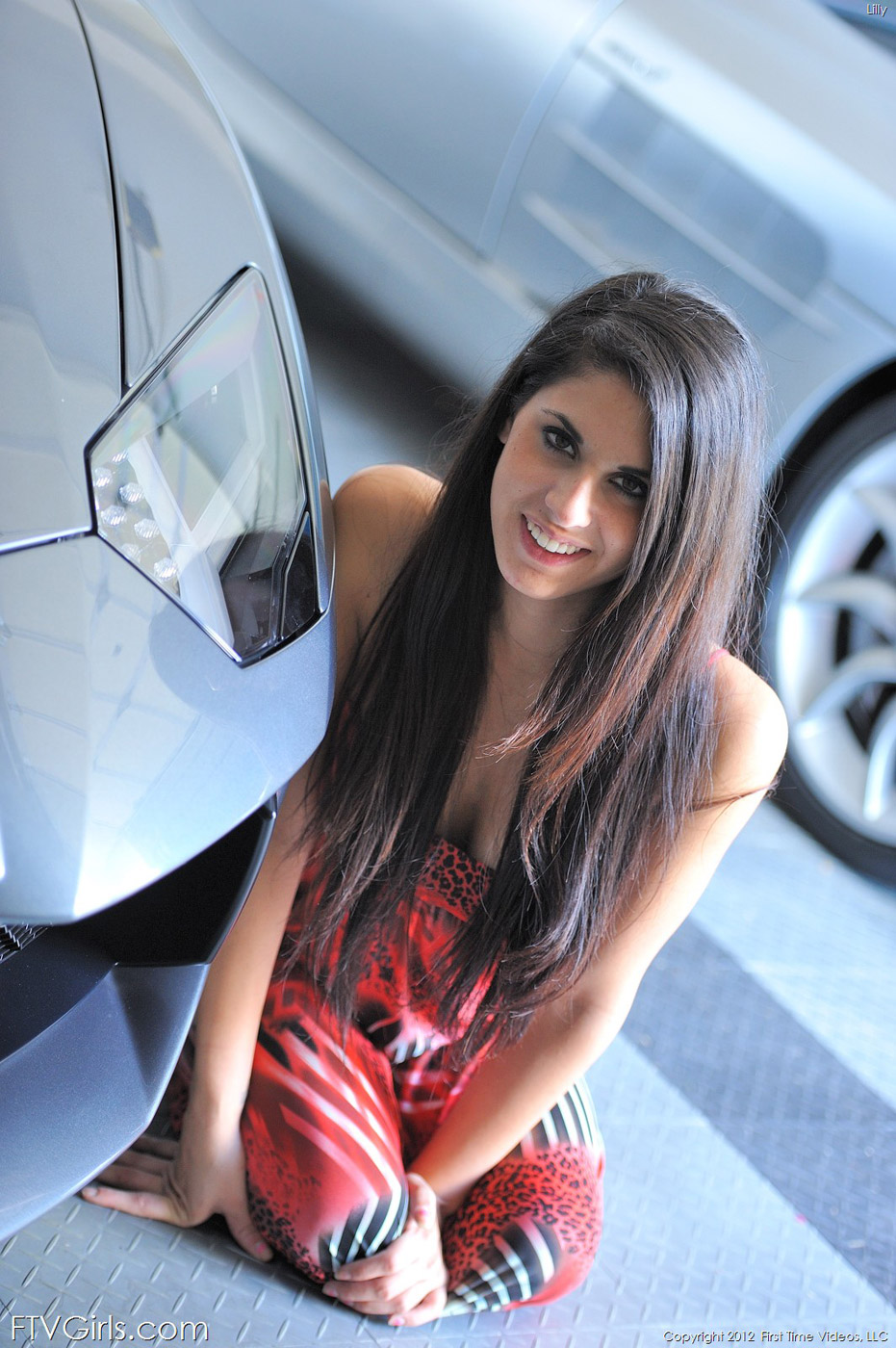 Lilly flashing by a car