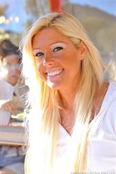 Tiffany shows off her shaved pussy