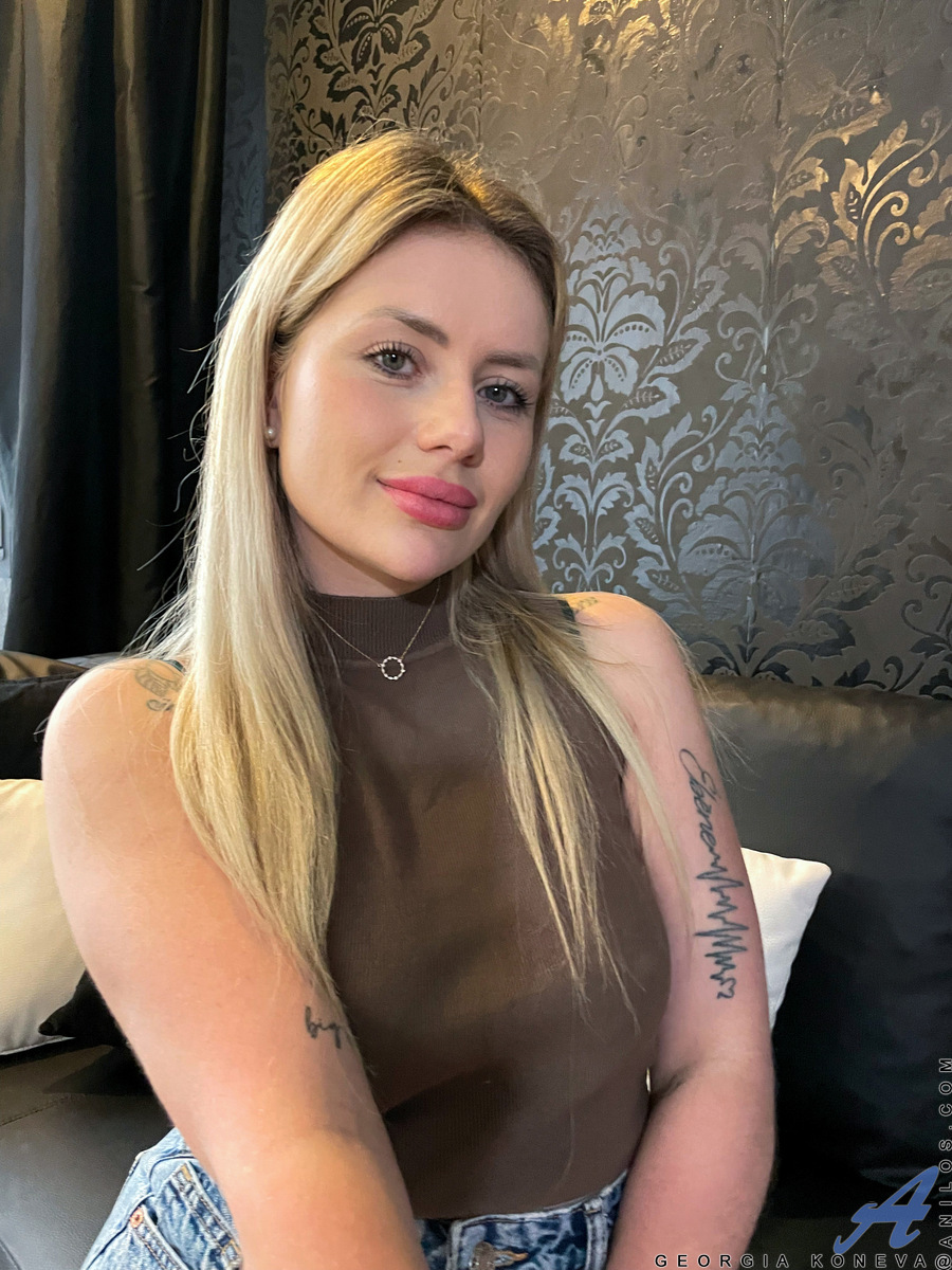 A compact and horny blonde babe with puffy lips and a do me attitude Georgia Koneva is a French housewife who loves to get naked.