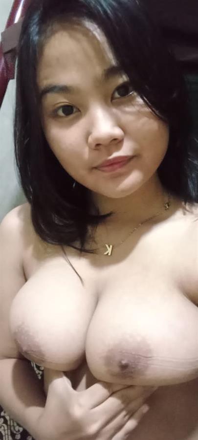 Karisma taking a selfie and - breasts