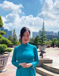Busty Vietnamese receptionist in ao dai