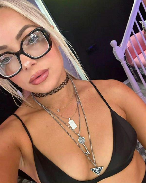 Liv Morgan in a bikini taking a selfie