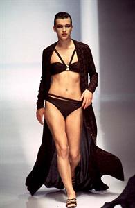 Milla Jovovich in a bikini in lingerie