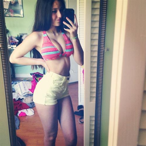 Angie Varona in a bikini taking a selfie